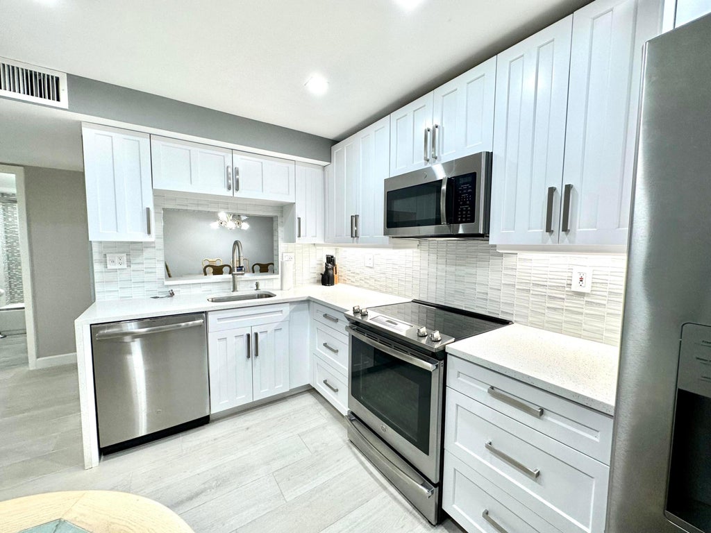 Photo of 15401 Pembridge Avenue #11, Delray Beach, FL 33484 (MLS # R10965055)