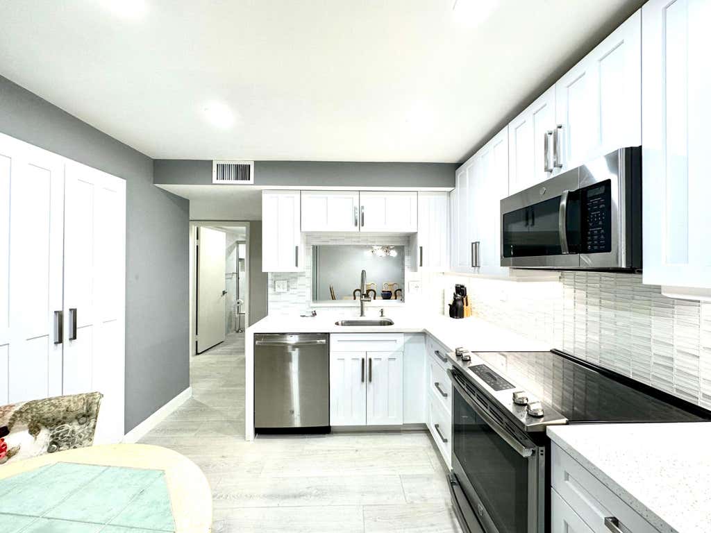 Photo of 15401 Pembridge Avenue #11, Delray Beach, FL 33484 (MLS # R10965055)