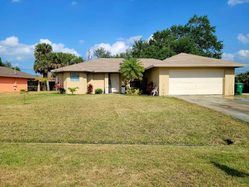 Photo of 2595 SW Mcdonald Street, Port Saint Lucie, FL 34953 (MLS # R10707025)