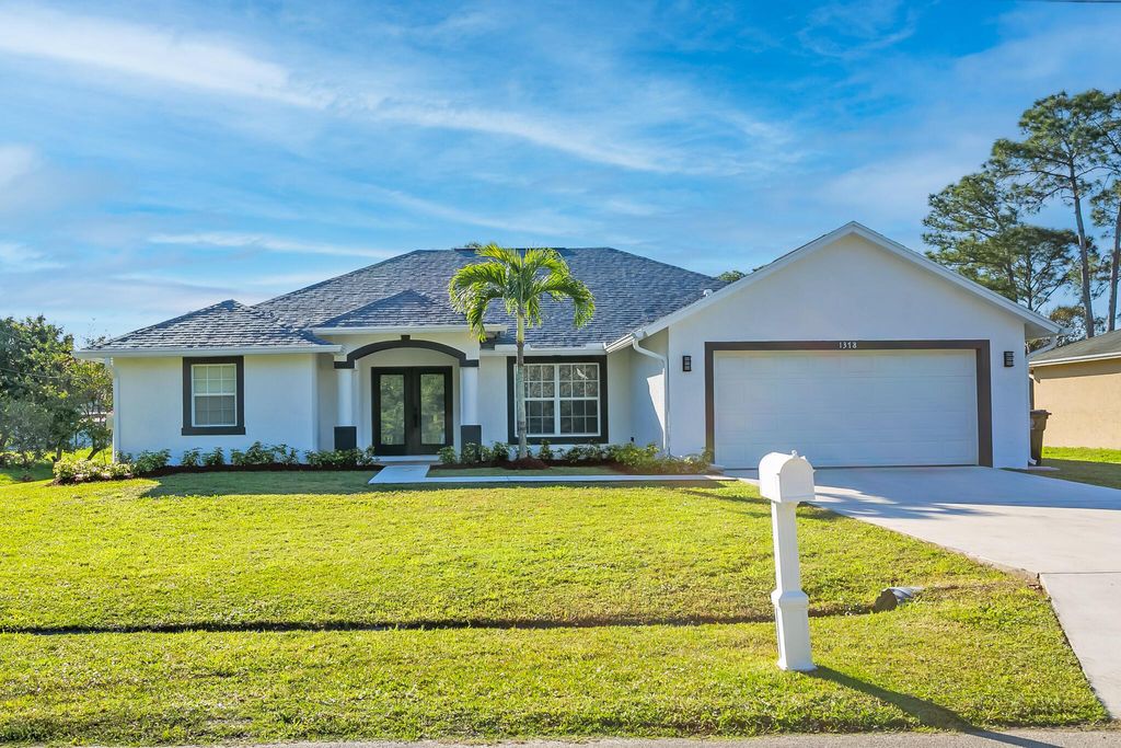 Photo of 1378 SW Glastonberry Avenue, Port Saint Lucie, FL 34953 (MLS # R10955810)
