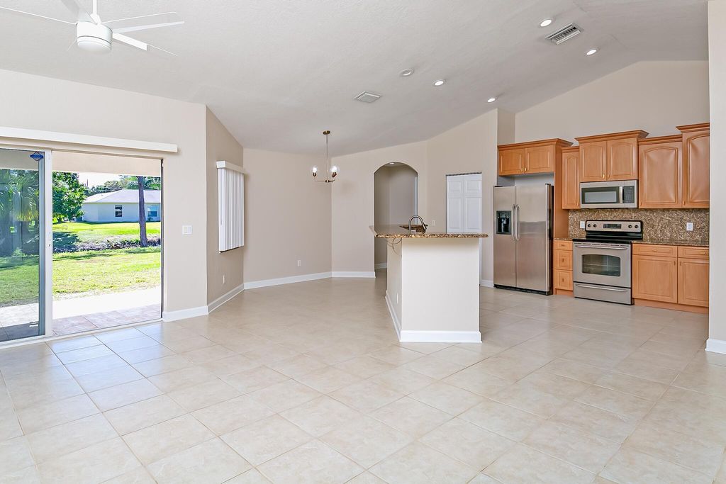 Photo of 1378 SW Glastonberry Avenue, Port Saint Lucie, FL 34953 (MLS # R10955810)