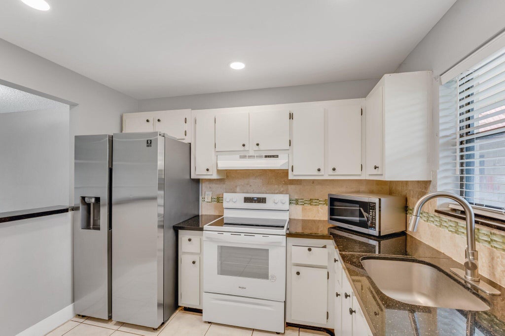 Photo of 21915 Lake Forest Circle #203, Boca Raton, FL 33433 (MLS # R11103512)