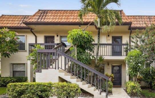 Photo of 7142 GOLF COLONY Court #102, Lake Worth, FL 33467 (MLS # B26063108)