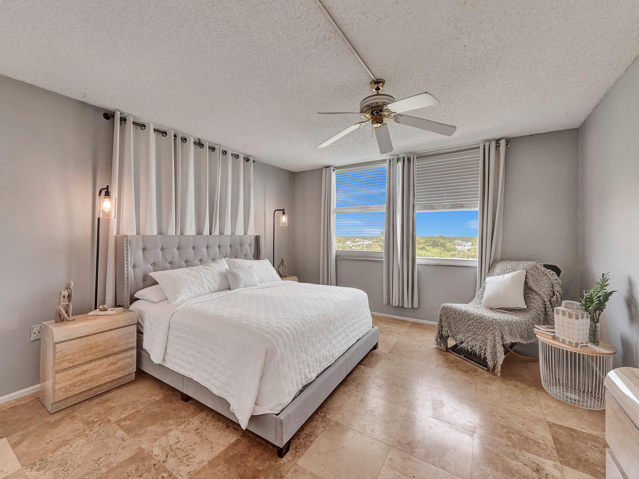 Luxury penthouse living in this top-floor, corner 2BR/2BA condo. Freshly painted with upgraded bathrooms and new kitchen countertops. Enjoy abundant natural light via impact windows and a secure lanai with hurricane shutters. Tiled floors throughout and a new AC system installed in 2021 enhance comfort. Community amenities include a clubhouse with pool, fitness center, party room, and library, plus barbecue pits, shuffleboard, and bocce court. Located within walking distance to shops, banks, and supermarkets, and minutes from vibrant downtown Delray, exquisite dining, and beaches. Ideal for 55+ residents seeking a premium lifestyle