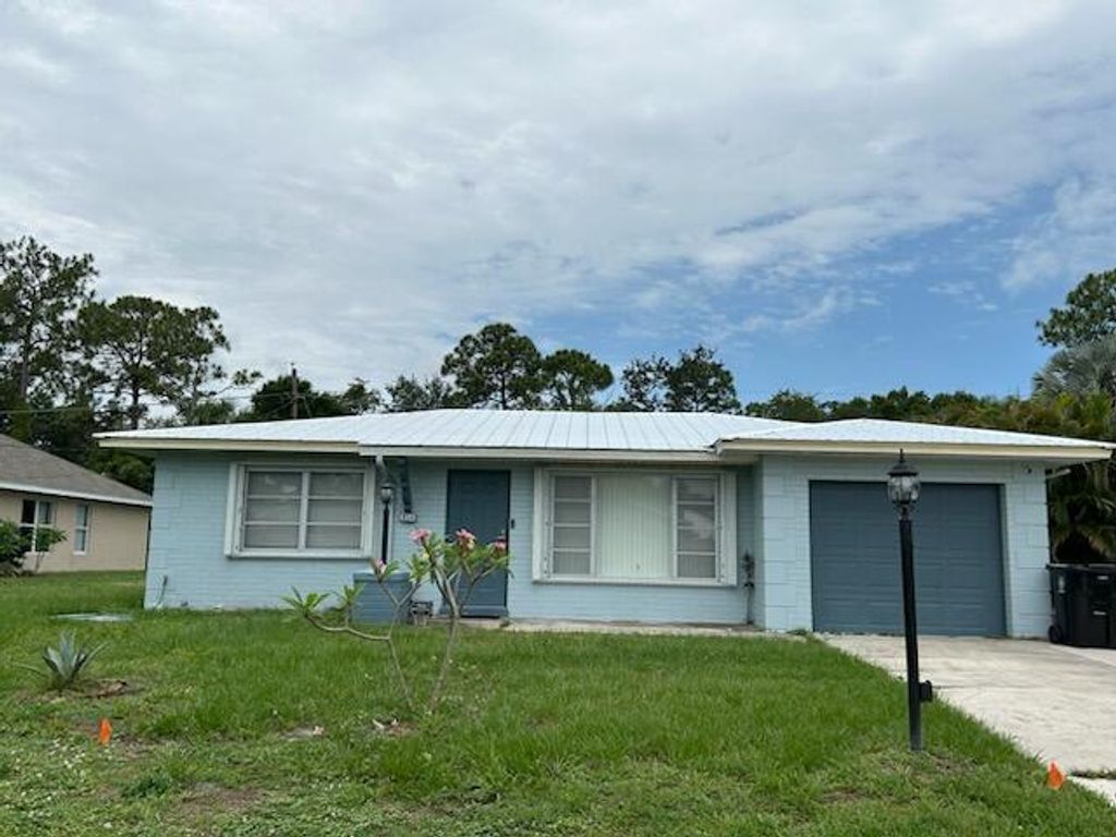 Photo of 854 SE Preston Lane, Port Saint Lucie, FL 34983 (MLS # R11095635)