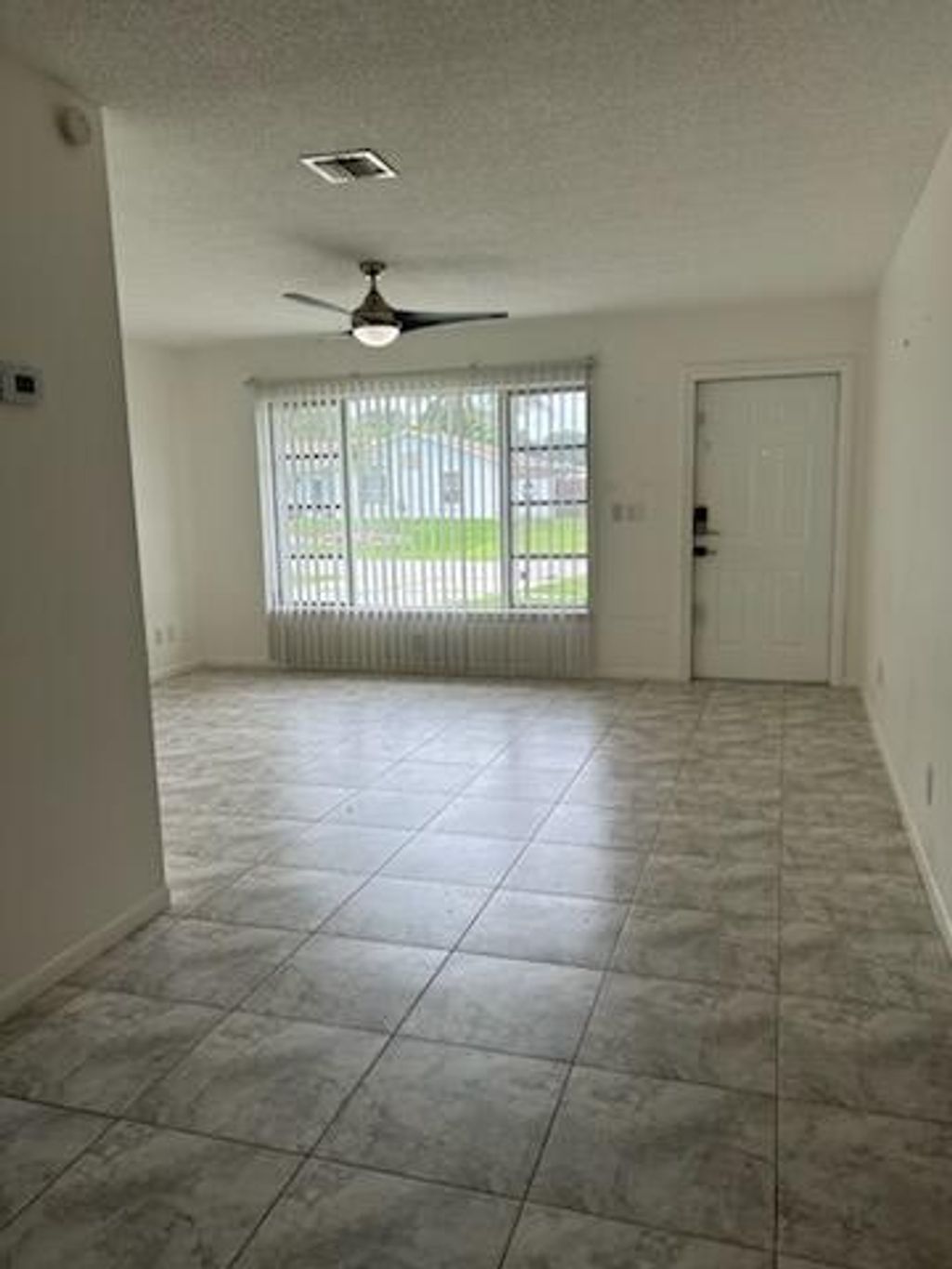 Photo of 854 SE Preston Lane, Port Saint Lucie, FL 34983 (MLS # R11095635)