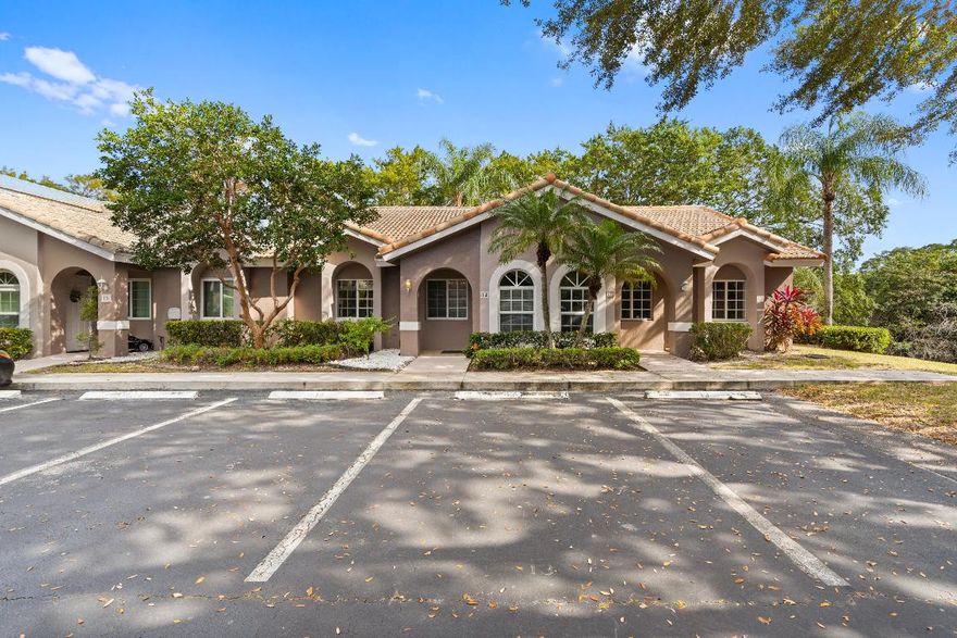 BEAUTIFUL, COMPLETELY RENOVATED 2/2 villa on golf course with water views//! In desirable Villas on the Green neighborhood. Fully renovated kitchen with wood cabinets, added island, granite countertops, and stainless steel appliances. Newly renovated bathrooms, laminate wood flooring throughout, stackable washer/dryer, and 6 month old A/C. Open floor plan with enclosed patio overlooking golf course and water. Impact windows , shutters for sliding glass doors, air ducks recently cleaned, two assigned parking places, roof approx. 7 years old, patio roof 2 years old. Low HOA with beautiful community pool.