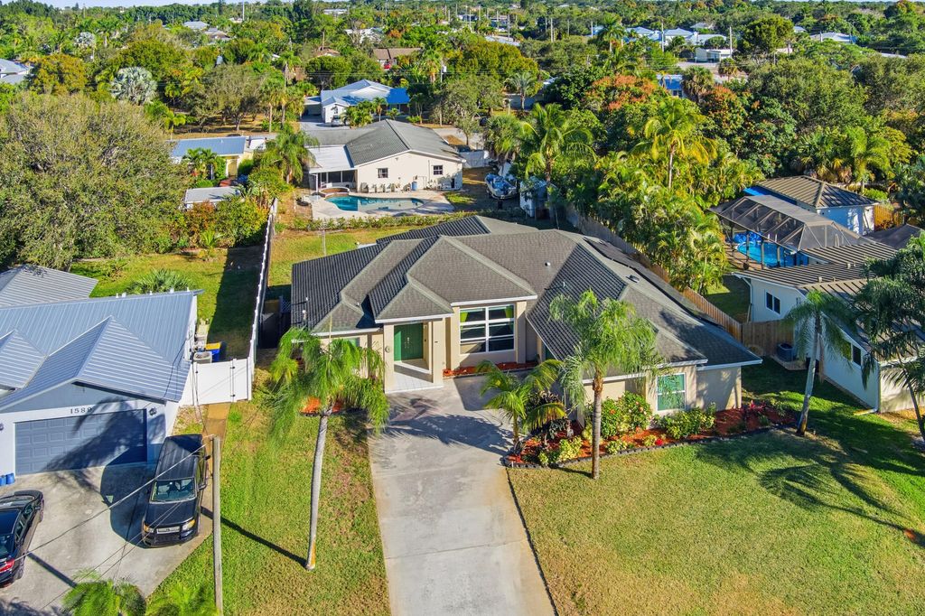 Photo of 1569 NE Amy Avenue, Jensen Beach, FL 34957 (MLS # B26023777)
