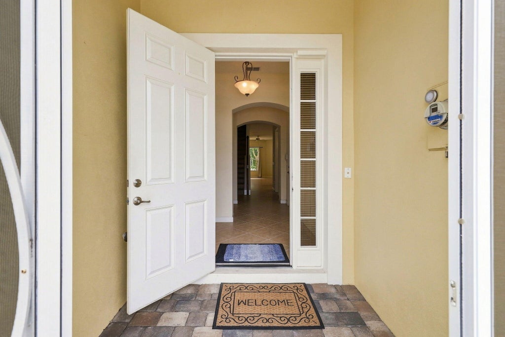 Photo of 6179 NW Helmsdale Way, Port Saint Lucie, FL 34983 (MLS # B26069927)