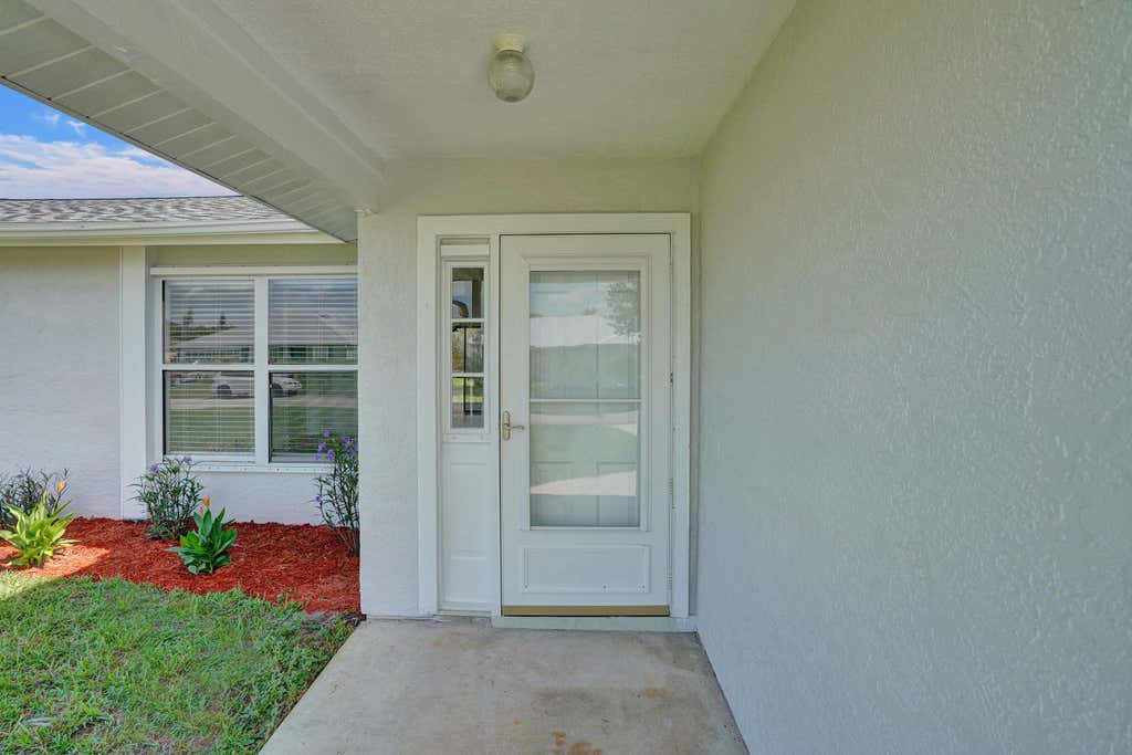 Photo of 347 SW Duxbury Avenue, Port Saint Lucie, FL 34983 (MLS # R11013227)