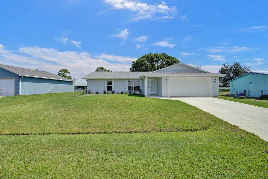 Photo of 347 SW Duxbury Avenue, Port Saint Lucie, FL 34983 (MLS # R11013227)