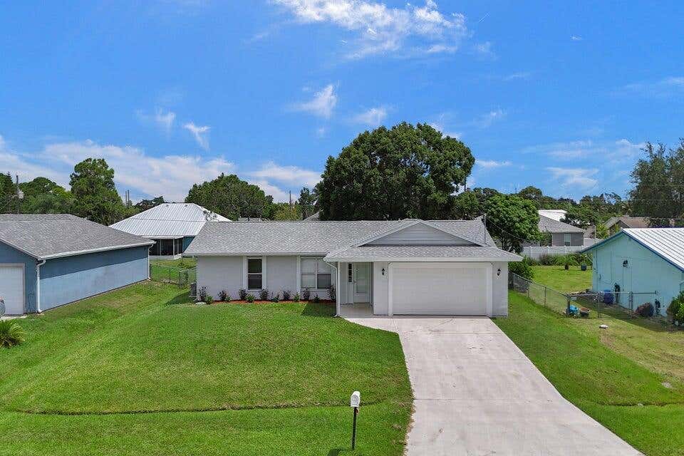 Photo of 347 SW Duxbury Avenue, Port Saint Lucie, FL 34983 (MLS # R11013227)