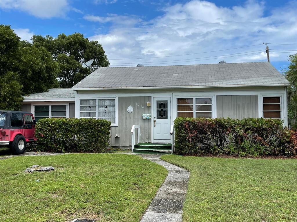 Photo of 1218 13th Avenue N, Lake Worth Beach, FL 33460 (MLS # R10747936)