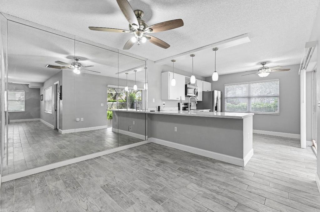 Photo of 38 Essex Court #A, Royal Palm Beach, FL 33411 (MLS # R11135186)