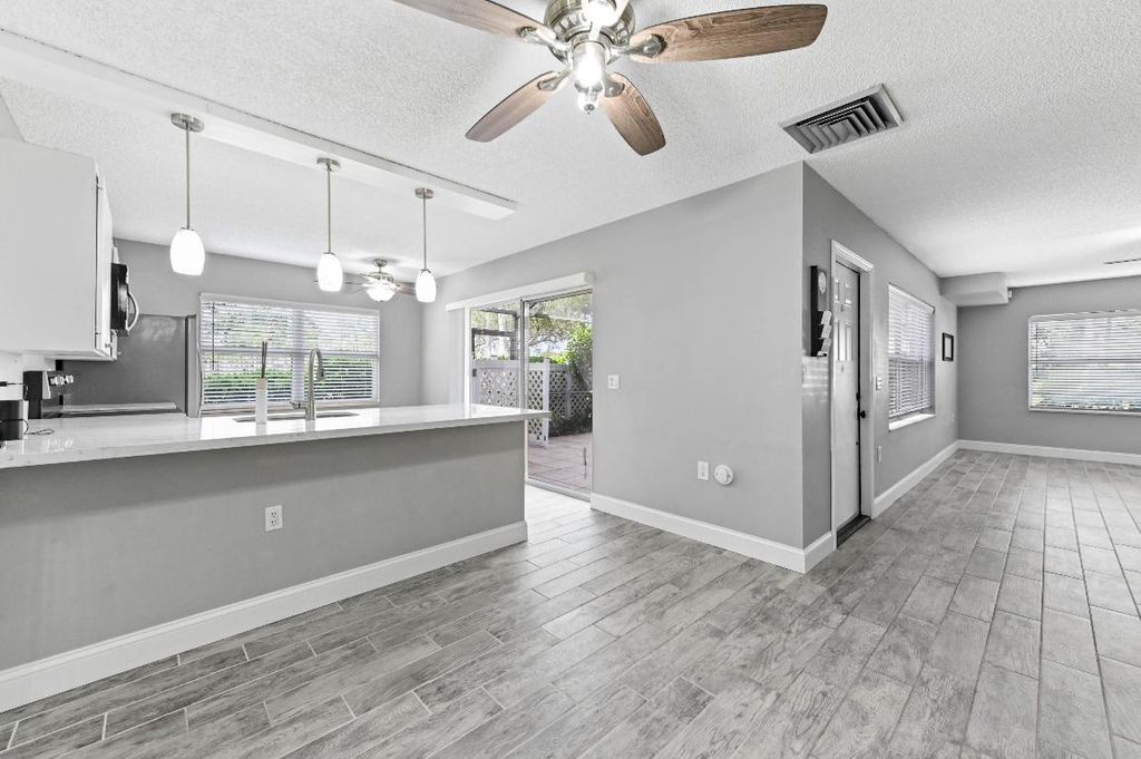 Photo of 38 Essex Court #A, Royal Palm Beach, FL 33411 (MLS # R11135186)