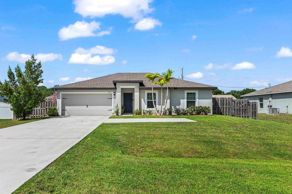 Photo of 3758 SW Darwin Boulevard, Port Saint Lucie, FL 34953 (MLS # R11117515)