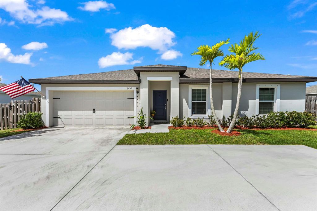 Photo of 3758 SW Darwin Boulevard, Port Saint Lucie, FL 34953 (MLS # R11117515)