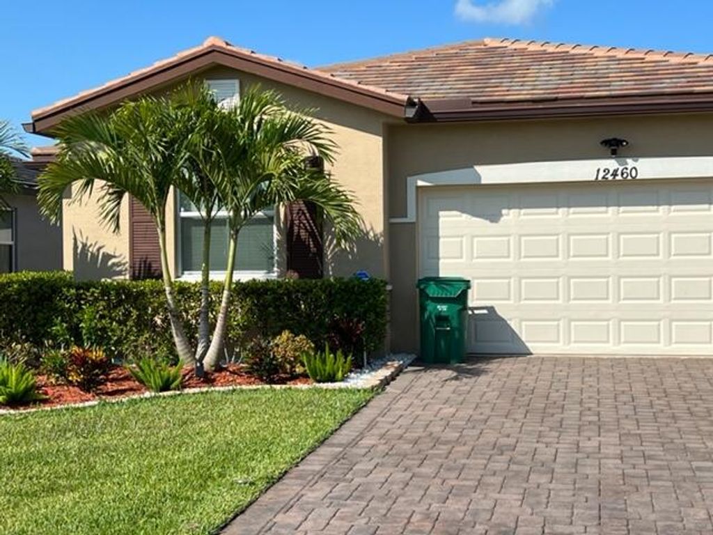 Photo of 12460 NW Mcgregor Lane, Port Saint Lucie, FL 34987 (MLS # B26009158)