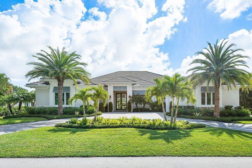 Shows like a model home, only 2 years old and offered furnished. Sited on a beautifully landscaped half-acre lot overlooking the 2nd hole of prestigious Old Marsh Golf Club. The Transitional style and luxury appointments will impress. 3 full garages and golf cart garage. Custom mahogany entry doors open to a large great room overlooking a beautiful pool and golf view. Quartz countertops, wide plank wood floors, tray, volume and box beam ceilings, recessed LED lighting, electric window blinds, custom window treatments, designer lighting fixtures and custom built-ins. Gourmet island kitchen has a Thermador double door refrigerator w/separate freezer, a 6 burner gas range w/griddle, 3 wall ovens, a large walk-in pantry, a steam oven and 2 refrigerator drawers. Previous Buyer default presents