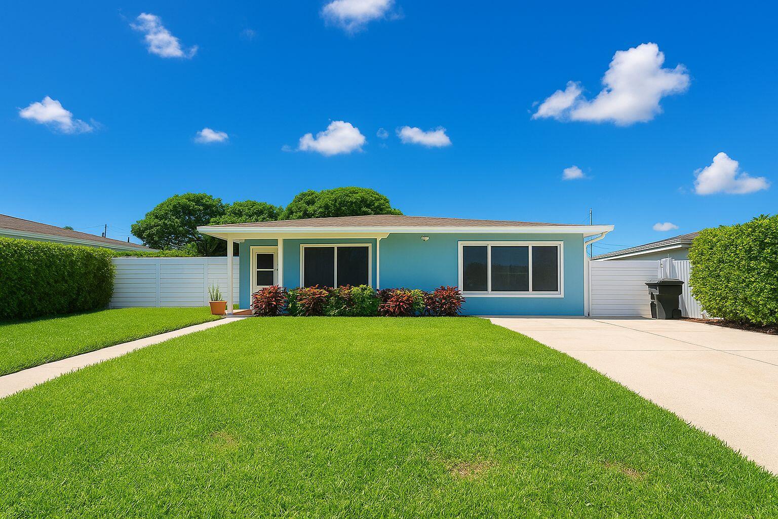 Welcome to this charming 3-bedroom, 2-bath home that blends comfort and convenience! Step inside to a spacious open-concept kitchen with a separate dining area, perfect for family gatherings. The beautifully manicured yard features a gazebo, ideal for entertaining guests, and there's even room to park an RV on the side. Enjoy peace of mind with hurricane-impact windows and doors, a new irrigation system, and the convenience of an in-unit laundry room. Energy-efficient solar panels help lower your monthly bills. Located directly across from Northwest Park and just minutes from I-95, this home offers easy travel access while keeping you close to recreation and community amenities. A must-see property that's move-in ready! No HOA