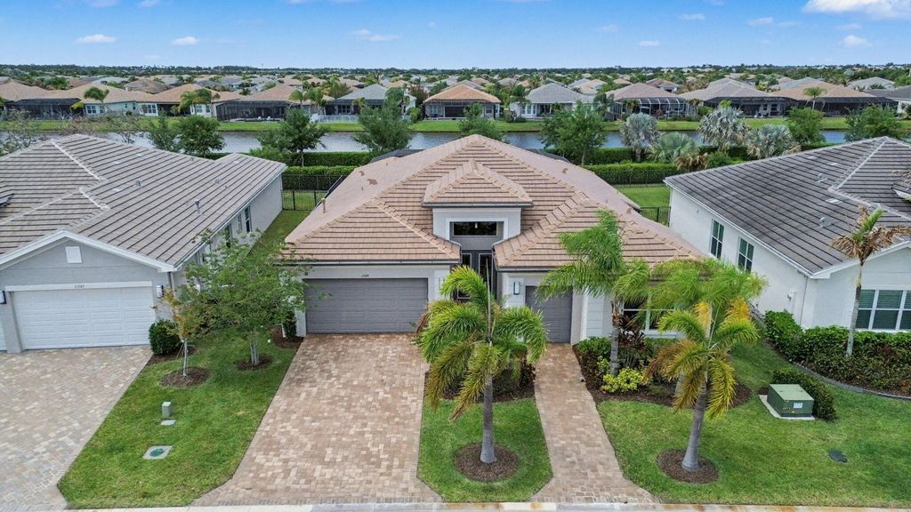 Photo of 11699 SW Coronado Springs Drive, Port Saint Lucie, FL 34987 (MLS # B26023126)
