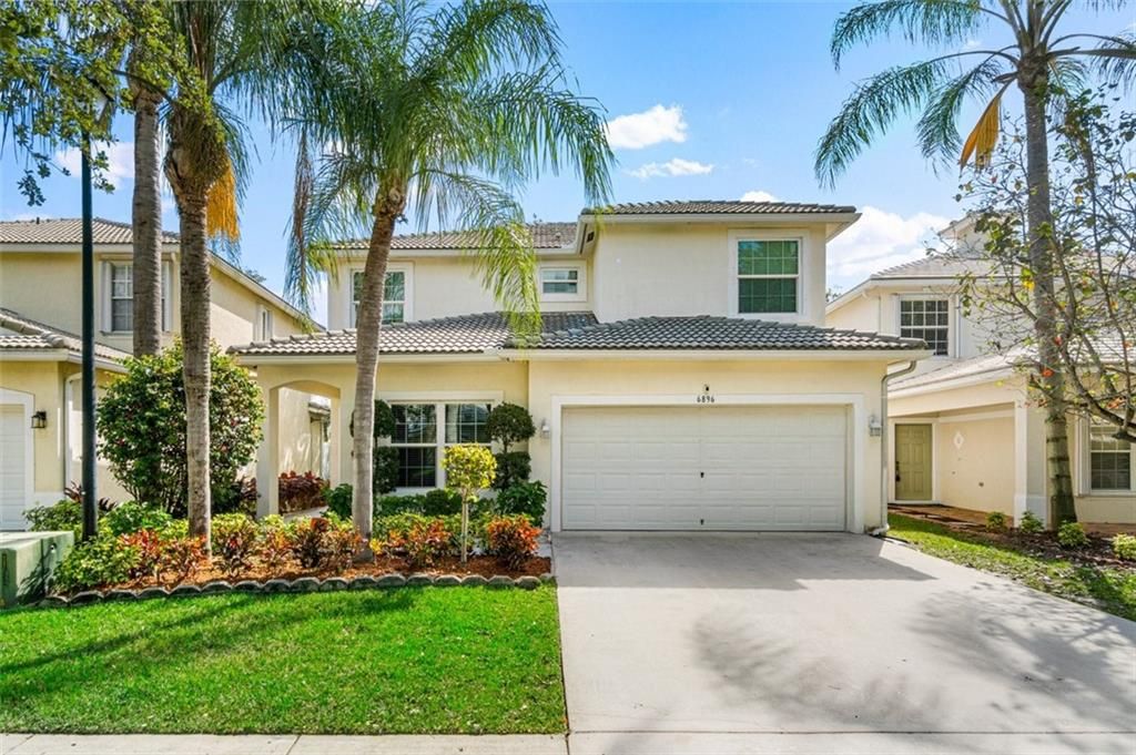 Photo of 6896 Lantern Key Dr, Lake Worth Beach, FL 33463 (MLS # F10327047)
