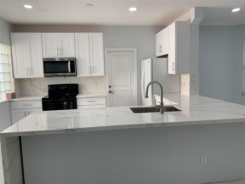 Photo of 15218 SW 49th Street, Davie, FL 33331 (MLS # F10466479)