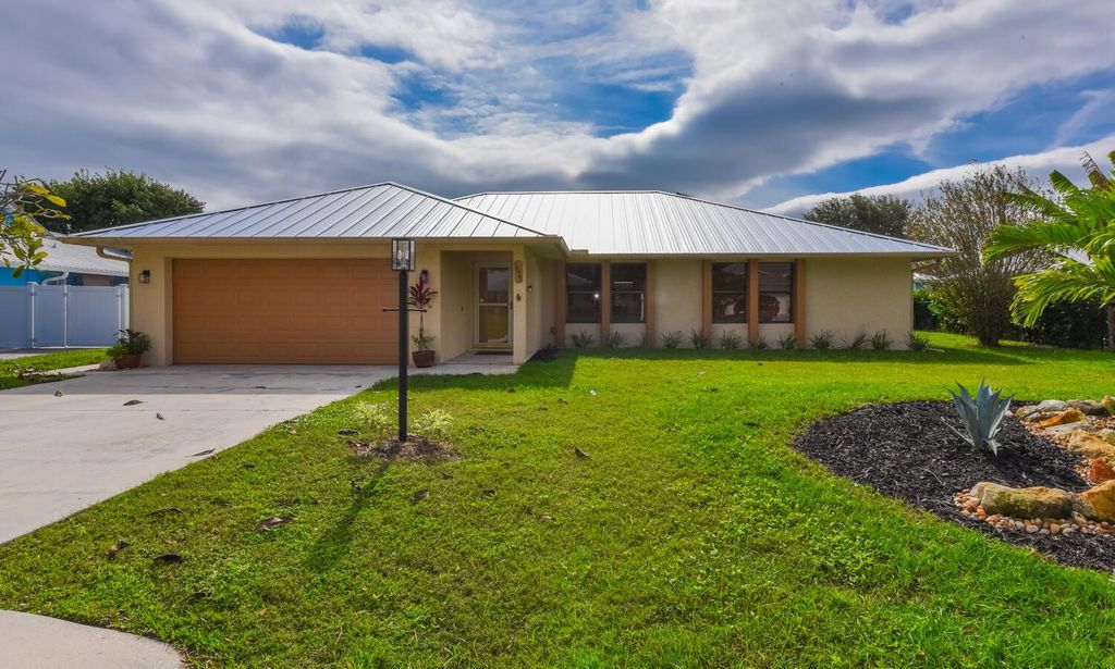Photo of 1927 NE San Carlos Calle, Jensen Beach, FL 34957 (MLS # R11126589)