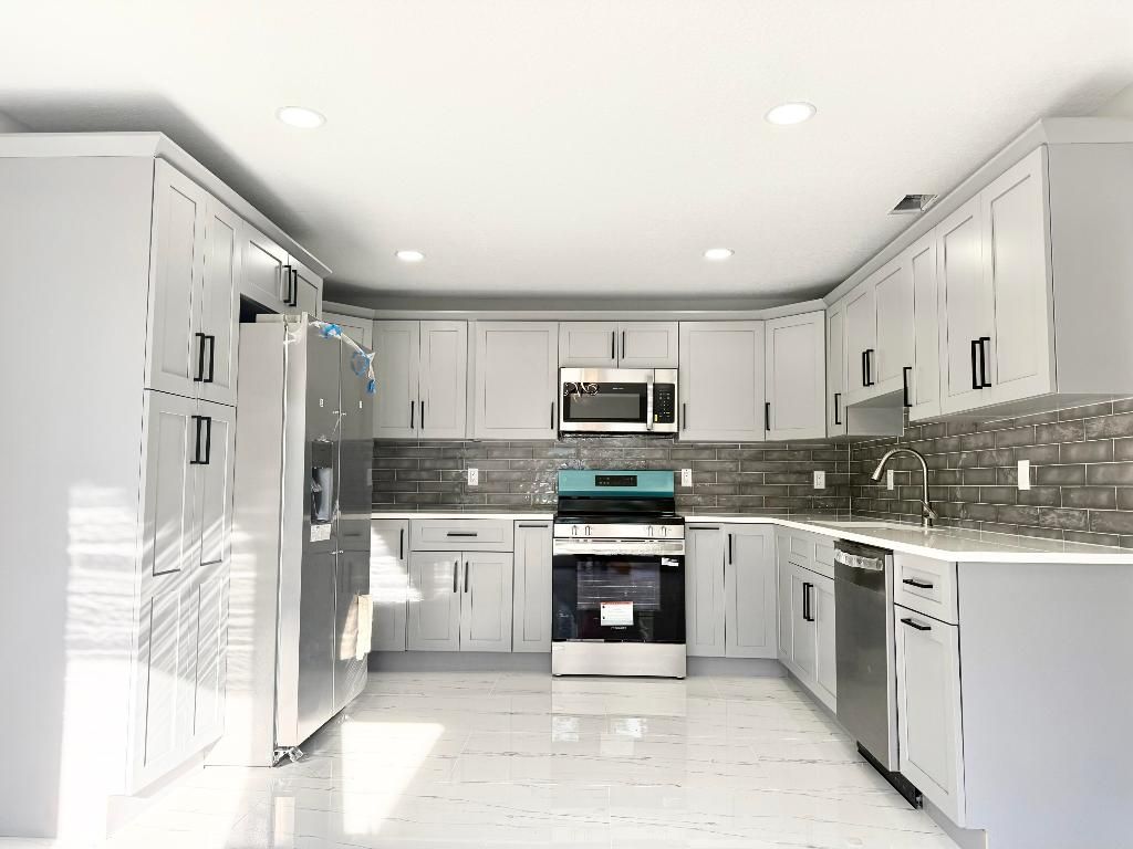 Photo of 3432 Southern Pines Drive, Fort Pierce, FL 34982 (MLS # R11140254)