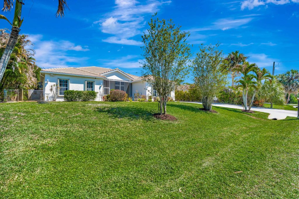 Photo of 8431 SE Duncan Street, Hobe Sound, FL 33455 (MLS # B26013959)