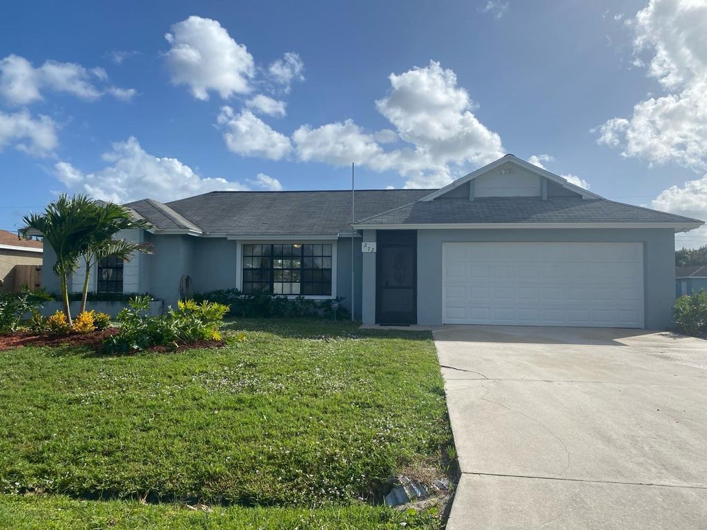 Photo of 272 SW Fairchild Avenue, Port St Lucie, FL 34984 (MLS # R10964299)