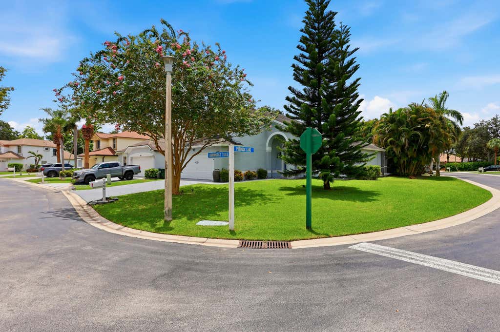 Photo of 360 Hammocks Trail, Greenacres, FL 33413 (MLS # B26059879)