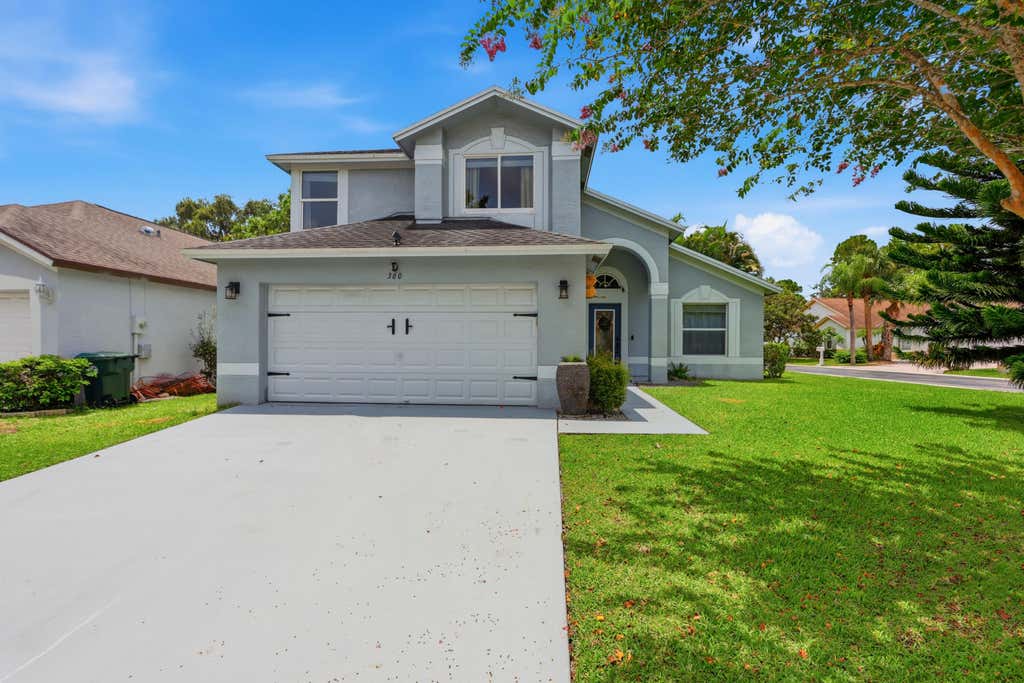 Photo of 360 Hammocks Trail, Greenacres, FL 33413 (MLS # B26059879)