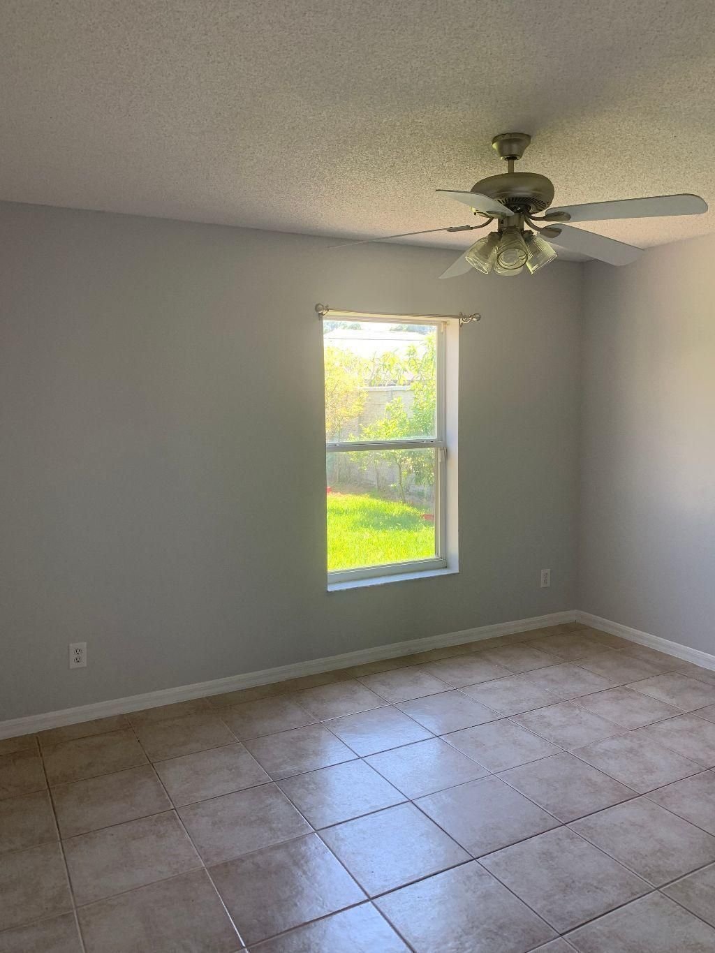 Photo of 2138 SW Devon Avenue, Port Saint Lucie, FL 34953 (MLS # R11103541)