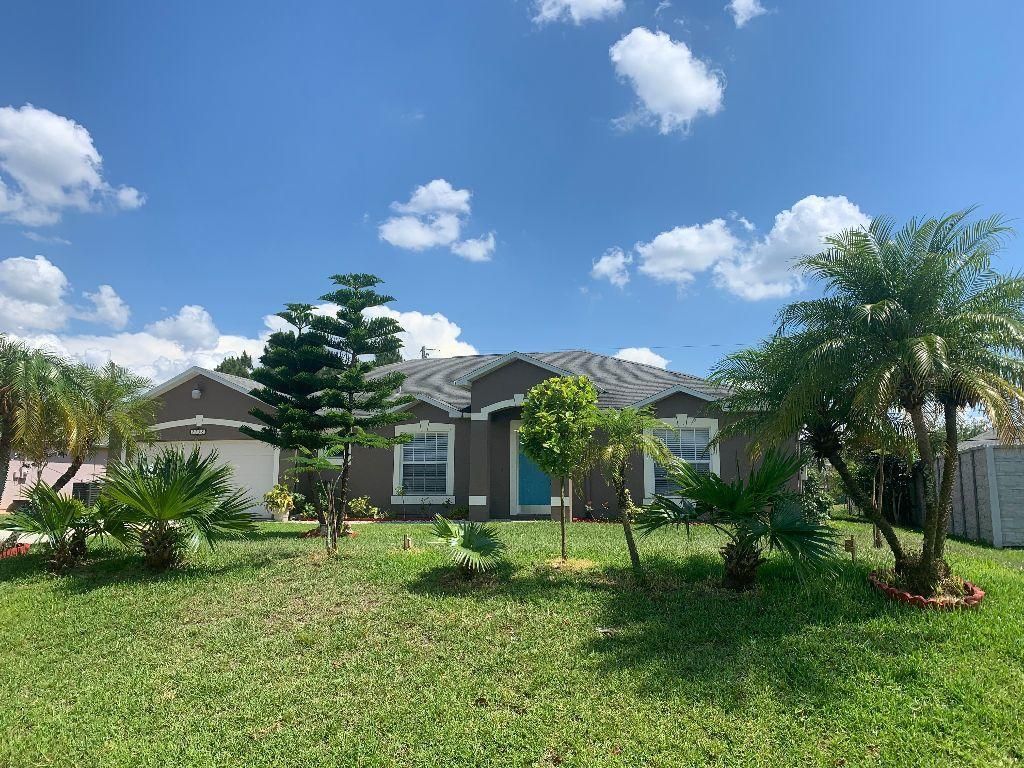 Photo of 2138 SW Devon Avenue, Port Saint Lucie, FL 34953 (MLS # R11103541)