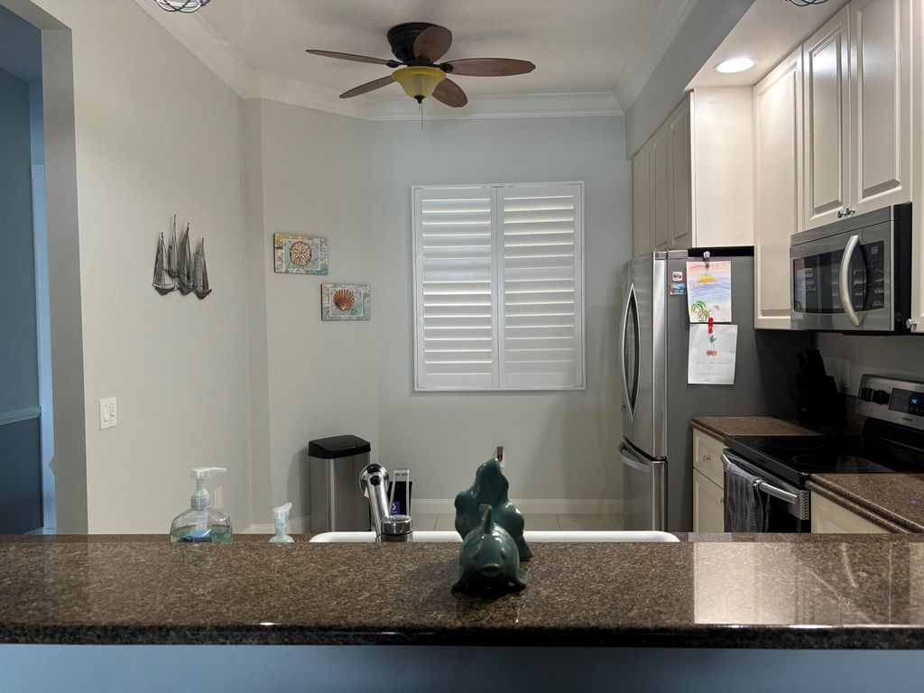 Photo of 13 Harbour Isle Drive W #106, Fort Pierce, FL 34949 (MLS # R11018018)