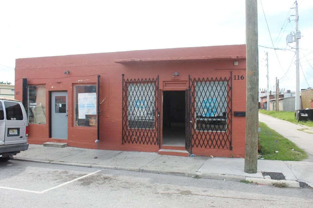 Photo of 116 SW 3rd St, Belle Glade, FL 33430 (MLS # R11130008)