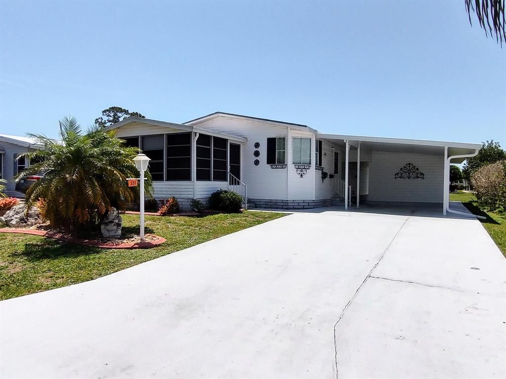 Photo of 331 Tropical Isles Circle, Fort Pierce, FL 34982 (MLS # R10888762)