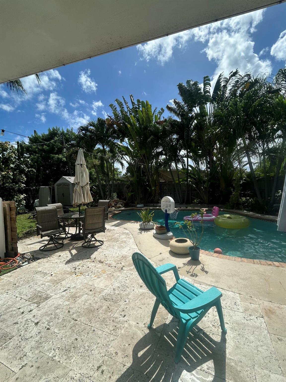 Enjoy South Florida living in this charming 2-bedroom, 1.5-bath home featuring a stunning private pool and tropical backyard retreat. The beautifully remodeled kitchen offers granite countertops, a custom backsplash, and stainless steel appliances. Impact windows and doors provide added peace of mind, while the fully fenced backyard is a true oasis--perfect for entertaining--with lush landscaping, a paver patio, and a sparkling, picture-perfect pool. Additional features include a one-car garage and a sprinkler system. Ideally located just minutes from the beach, downtown, Wilton Manors, and I-95. Come see this hidden gem! Priced to sell fast!
