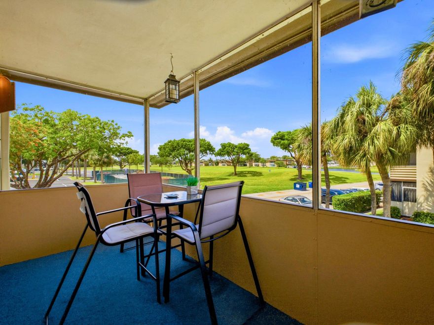 Welcome to 755 Normandy P, a beautifully maintained 2-bedroom, 2-bath corner residence in the sought-after Normandy section of Kings Point. Perfectly positioned on the second floor just steps from the lift, this home offers both convenience and privacy in a vibrant 55+ community.  From the moment you walk in, you'll notice the care and pride of ownership—this home has been lightly lived in as a seasonal retreat and is in excellent condition. The corner location allows for abundant natural light, creating a bright and inviting living space throughout.  Enjoy peaceful golf course views from your private screened lanai—an ideal spot for morning coffee or unwinding in the evening with serene green surroundings.  Inside, the home features impact windows throughout, updated flooring,  and a well-maintained kitchen with newer appliances. Both bathrooms have been tastefully updated with new vanities and a walk in shower. Major systems have already been addressed, with the A/C and water heater replaced within the past five years, giving buyers added confidence.  One of the standout features is the convenient outdoor laundry room with a full-size washer and dryer located just outside off of the lanai, offering functionality without sacrificing interior space.  Offered fully furnished/turnkey, this home is truly move-in ready—perfect for seasonal use or full-time Florida living.  Residents of Kings Point enjoy access to a wide range of amenities including multiple pools, clubhouse, fitness center, golf, tennis, entertainment, and community transportation, all within a gated and well-maintained setting. Ideally located just minutes from shopping, dining, and everything Delray Beach has to offer!   If you're looking for a clean, updated, move-in ready unit with golf course views and exceptional convenience—this is the one.