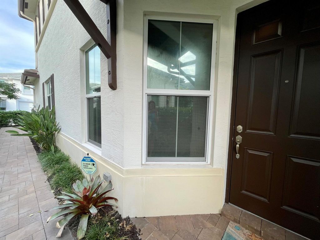 Photo of 4936 Pointe Midtown Way, Palm Beach Gardens, FL 33418 (MLS # R10947630)