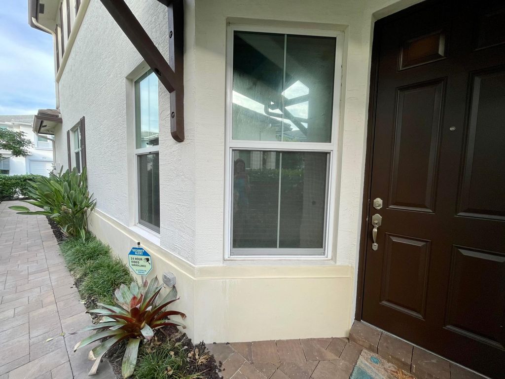 Photo of 4936 Pointe Midtown Way, Palm Beach Gardens, FL 33418 (MLS # R10947630)