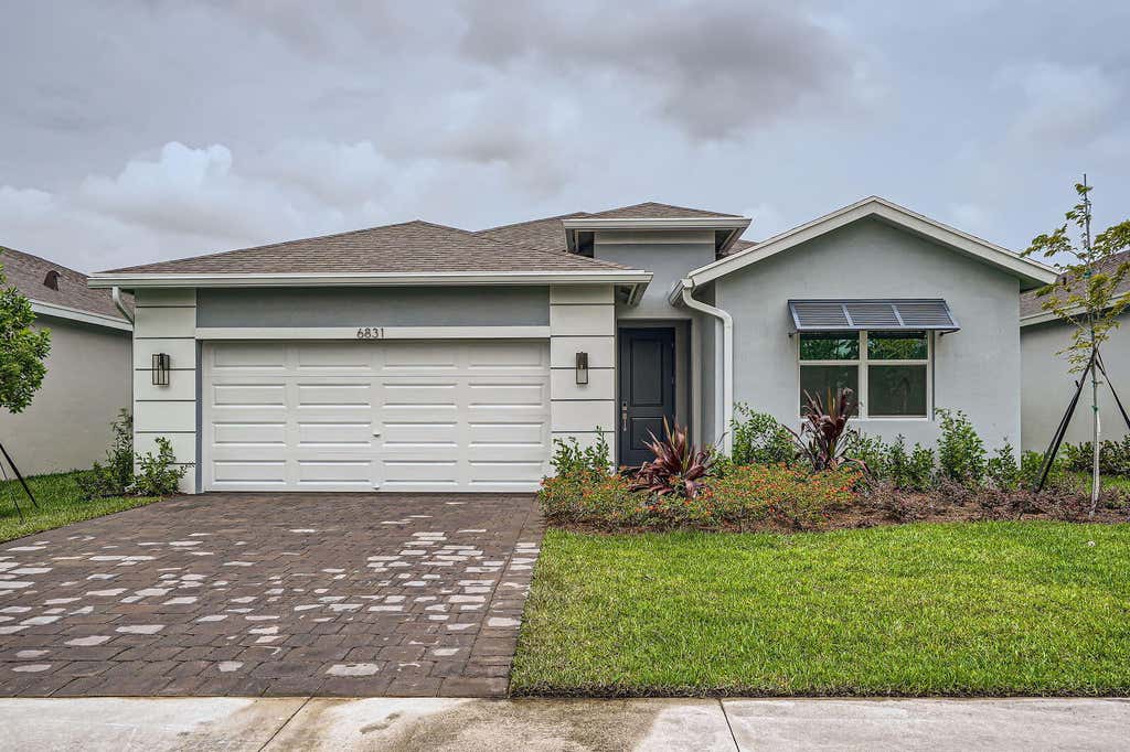 Photo of 6831 SE Park Trace Drive, Stuart, FL 34997 (MLS # R11060978)