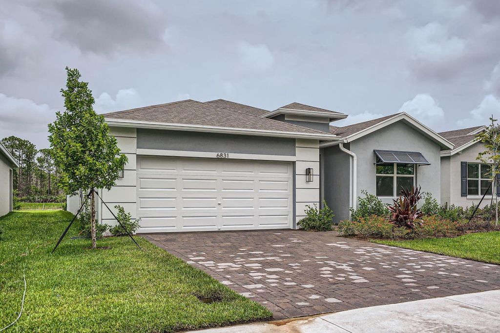 Photo of 6831 SE Park Trace Drive, Stuart, FL 34997 (MLS # R11060978)