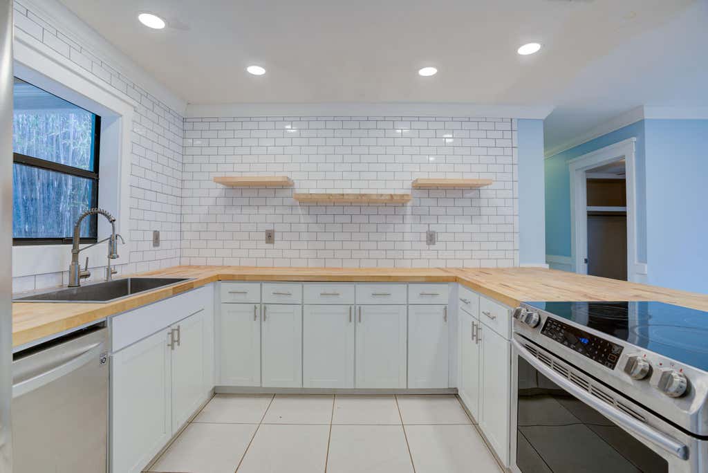 Photo of 709 Gumtree Road, North Palm Beach, FL 33408 (MLS # R10963585)