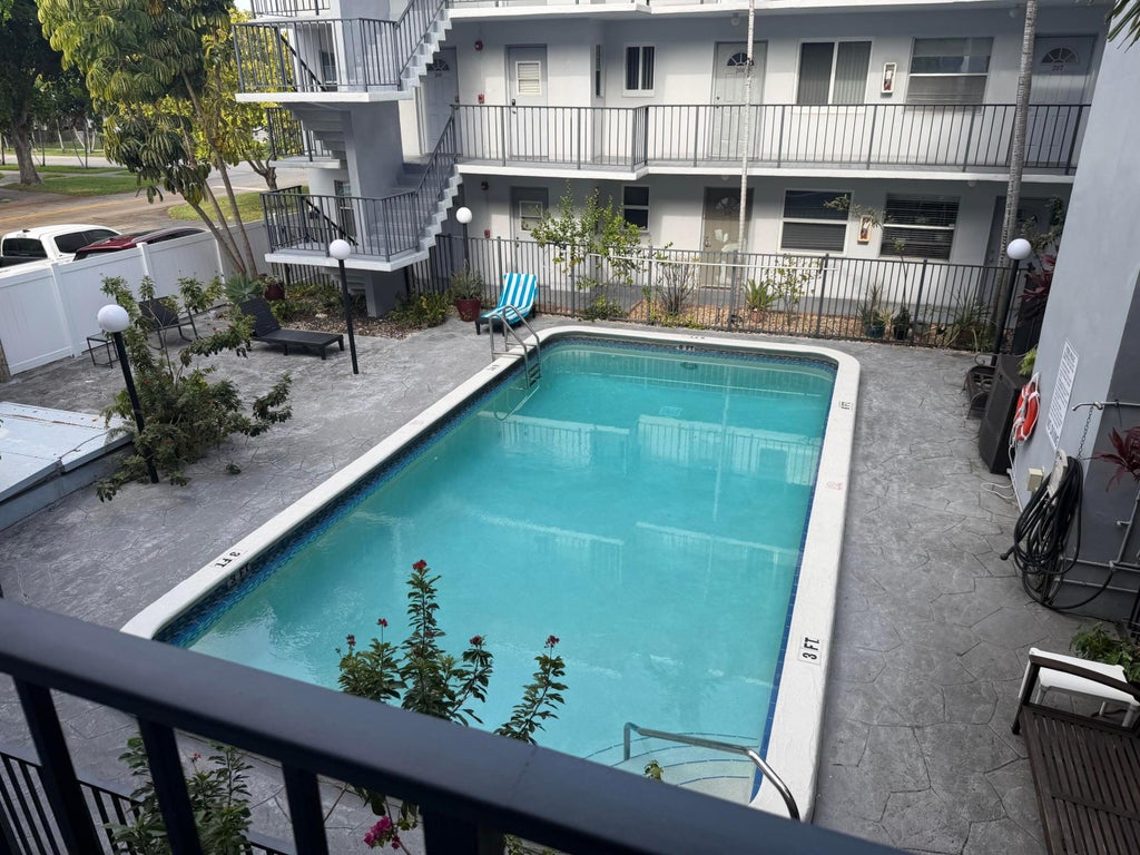 Photo of 714 NE 10th Street #205, Hallandale Beach, FL 33009 (MLS # B26068840)