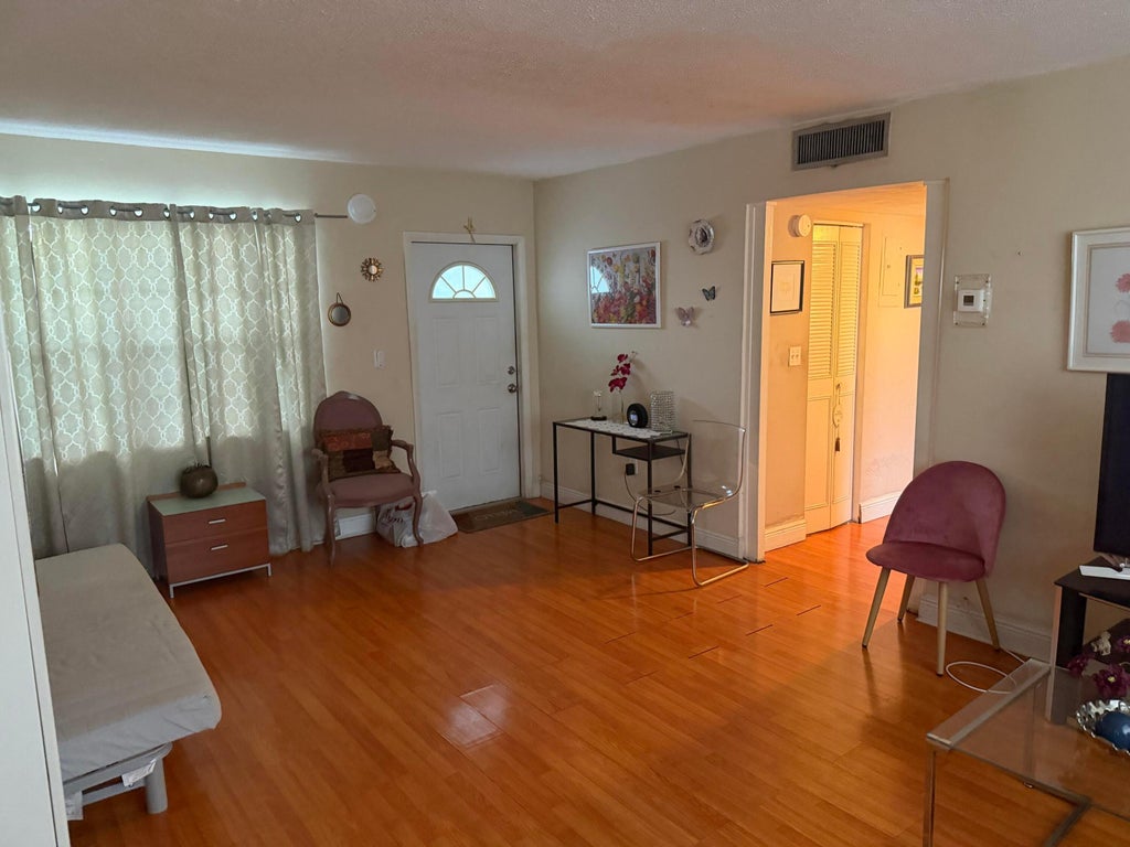 Photo of 714 NE 10th Street #205, Hallandale Beach, FL 33009 (MLS # B26068840)