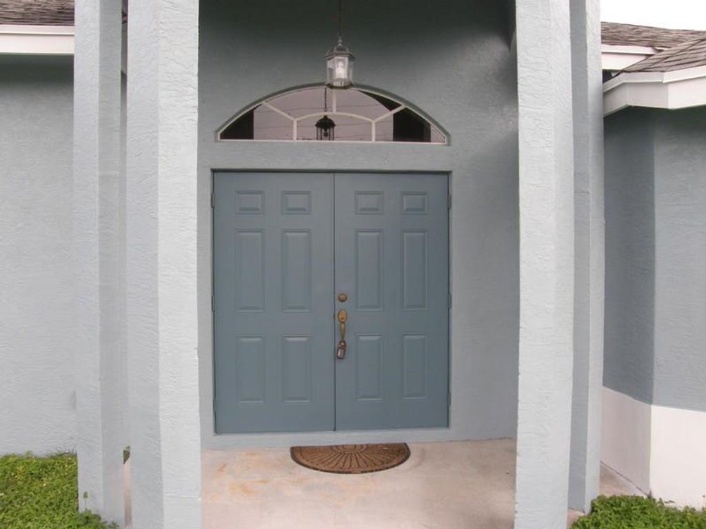 Photo of 1985 SW Sunglow Street, Port Saint Lucie, FL 34953 (MLS # R10712725)