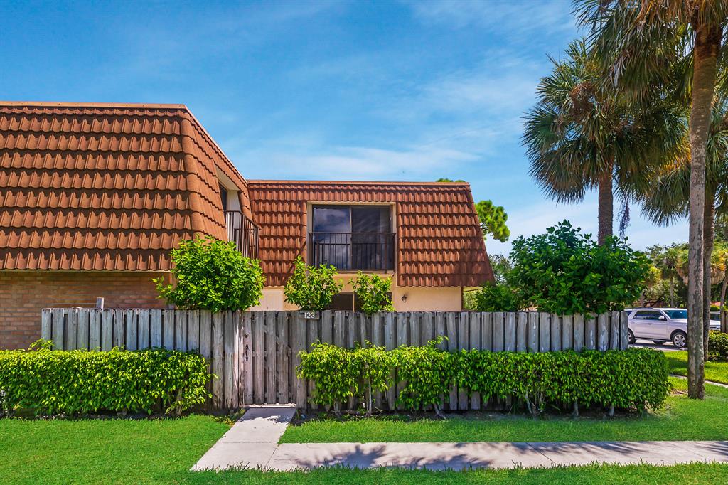 Welcome to paradise! Community sidewalks lead the way to your private entry through a well maintained courtyard. This 2 bed 2.5 bath Villa is a show stopper. Completely renovated from top to bottom, quite literally. Two spacious rooms are located upstairs with fully renovated bathrooms. Downstairs you have a large living space, separate dining, half bath, new washer and dryer, and best of all the updated kitchen. White shaker cabinets, soft close drawers, and open shelving provide the perfect balance between practical storage and chic design. Stainless steel appliances, quartz countertops, and a stylish backsplash complete your dream kitchen. Freshly painted walls and banisters, new wood plank vinyl flooring and new baseboards give the home an overall elevated look.