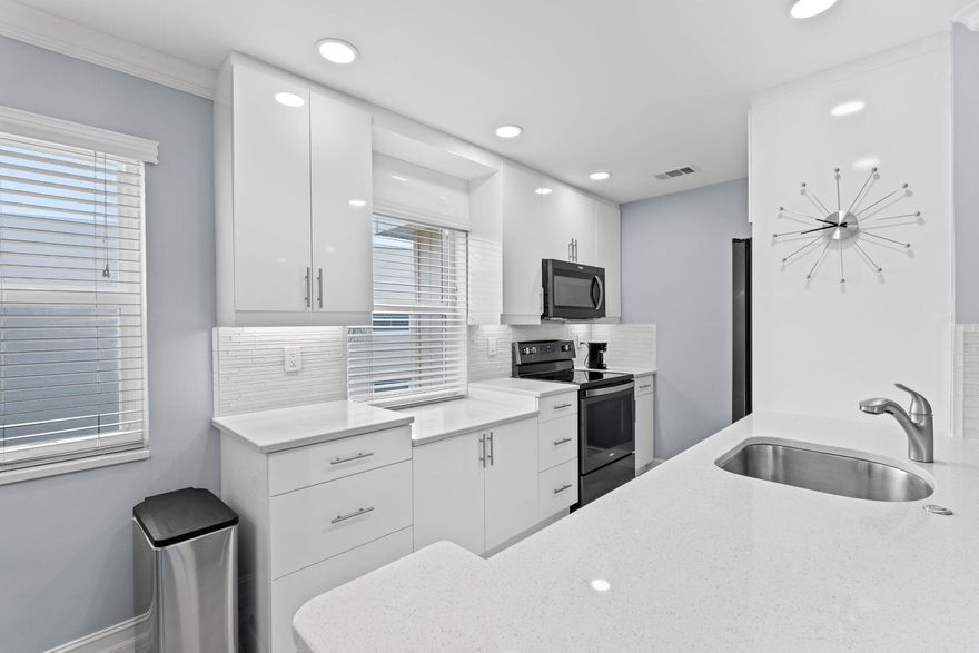 Welcome to this totally renovated residence in the heart of Delray Beach. Freshly painted and featuring a large, open floor plan, this home offers a bright and airy layout perfect for everyday living and entertaining. Ideally located next to the elevator for added convenience, this move-in-ready unit features a brand-new kitchen and updated bathrooms, combining modern style with comfort.